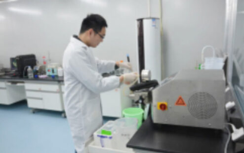 Technician working at a clean bench in the laboratory